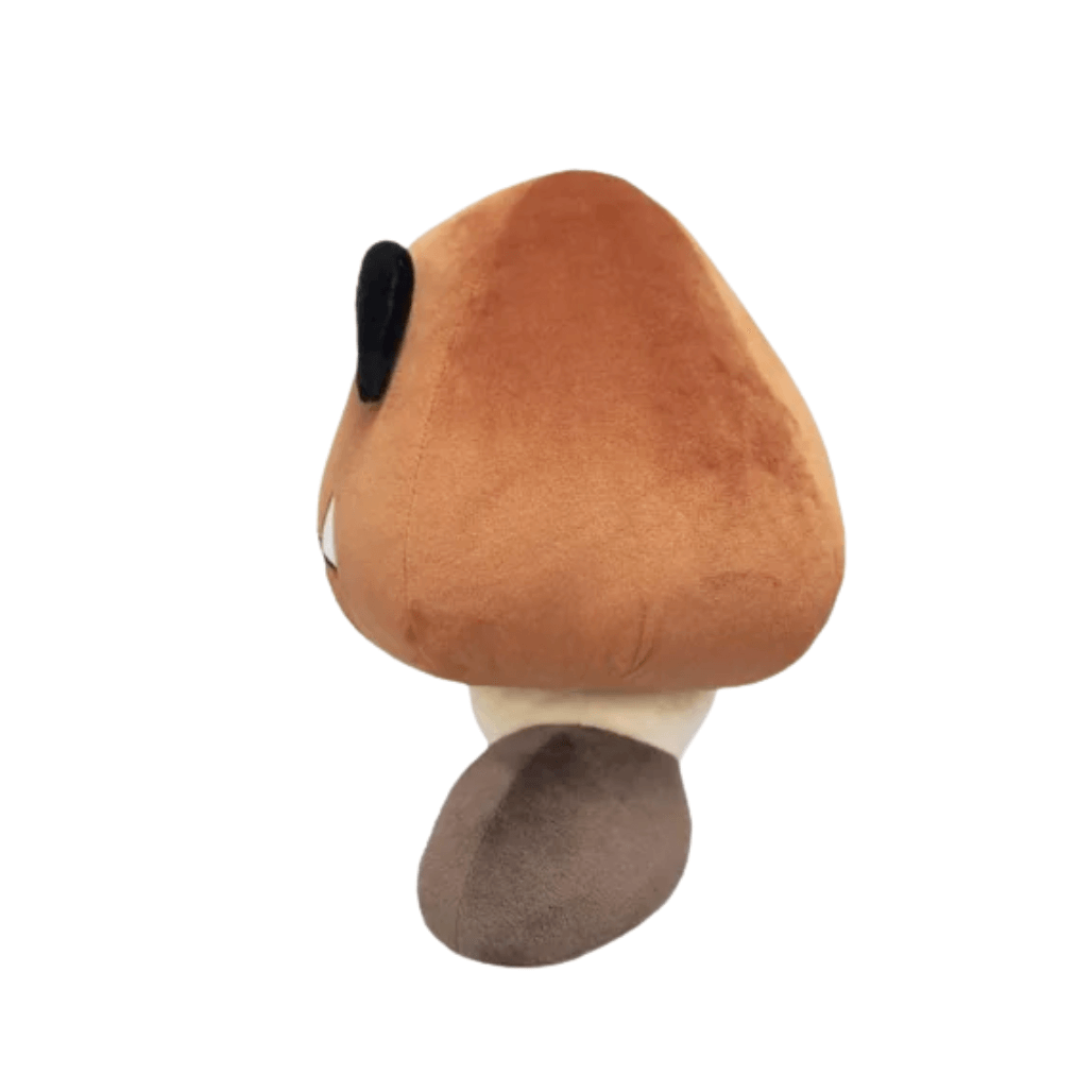 Peluche Goomba de 14cm montrant le dos, emblématique du jeu vidéo Mario, hostile et mignon.